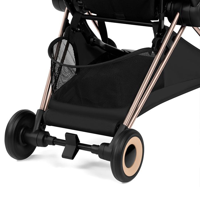 Cybex COYA STYLE wózek spacerowy — Rosegold frame and basket detail; upholstery colour not established in close-up